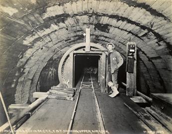 (BOSTON TRANSIT COMMISSION) An album with 23 photographs depicting construction of the Boston subway system,